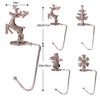 TNBRUA 4Pcs Christmas Stocking Holders, Mantel Christmas Stocking Hangers for Fireplace, Christmas Stocking Clips in 4 Styles, Non-Slip Christmas Stocking Clips for Christmas Party Decoration(Silver)
