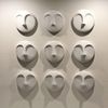 HomeRoots Round Matte White Glaze Finish Ceramic Face Wall Sculpture