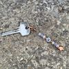 Handmade keyring with letters, including gift box.