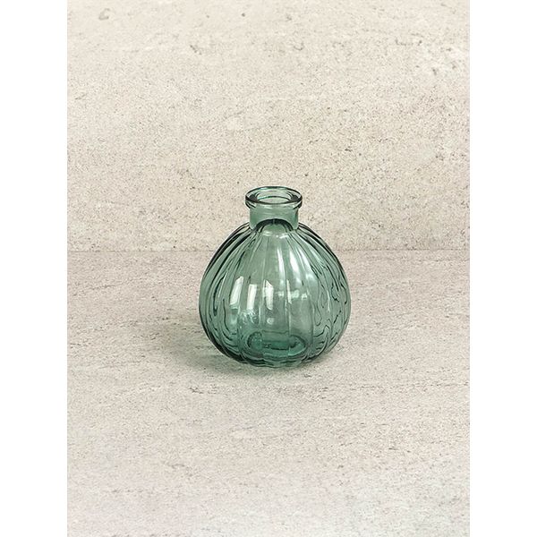 Colored glass vase in the shape of a lucky charm