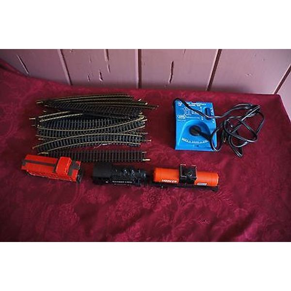 MIXED LOT: TOY TRAINS, TRACKS AND TRANSFORMER