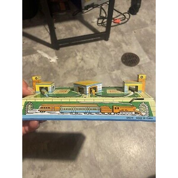 VINTAGE TIN WIND UP Train Station Toy Made in China. No Key MS279