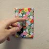 GRAPHICS & MORE Black Cat Hiding in Spring Flowers Plastic Wall Decor Toggle Light Switch Plate Cover