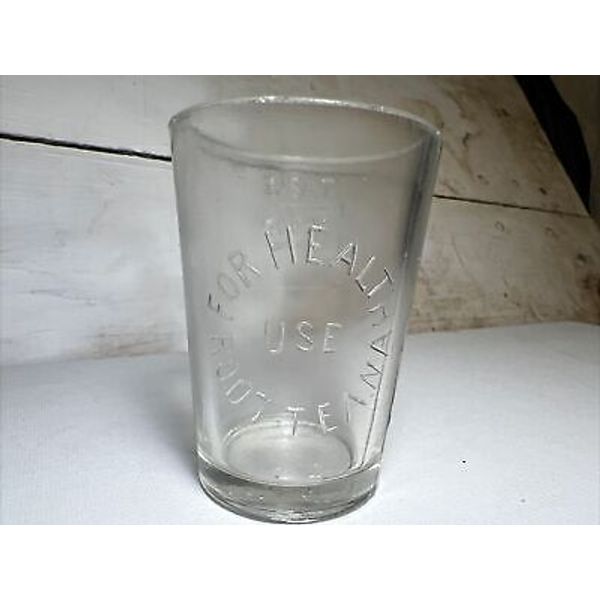 EARLY VTG (USE ROOT-TEA-NA FOR HEALTH) EMBOSSED DOSE SHOT GLASS. Backwards 4