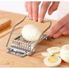 An Egg And Vegetable Slicer Kitchen Tool