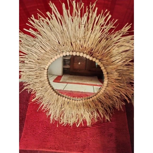 very large handmade raffia mirror with wood beads. beautifully handcrafted