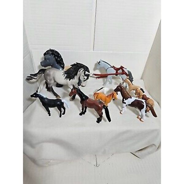 Mixed lot of toy horses all brands lot of 10 pieces