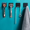 HoitoDeals 1Pcs Black Wall Mounted Adhesive Razor Holder For Bathroom Shower Hook Rack Shaver