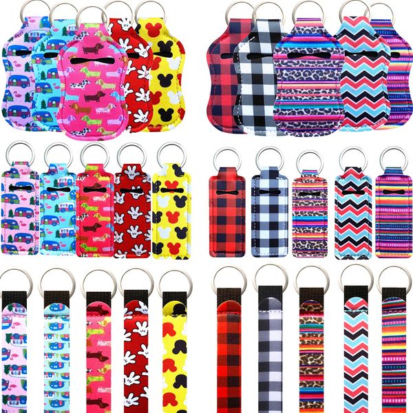 PUEZOKLY 40pcs Travel Bottles Keychain Set with Wristlet Chapstick Holders, Hand Sanitizer Holder Keychain with Empty Bottles