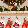TNBRUA 4Pcs Christmas Stocking Holders, Mantel Christmas Stocking Hangers for Fireplace, Christmas Stocking Clips in 4 Styles, Non-Slip Christmas Stocking Clips for Christmas Party Decoration(Gold)