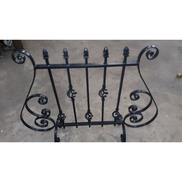 DECORATIVE  ROUT IRON . FIREPLACE SCREEN