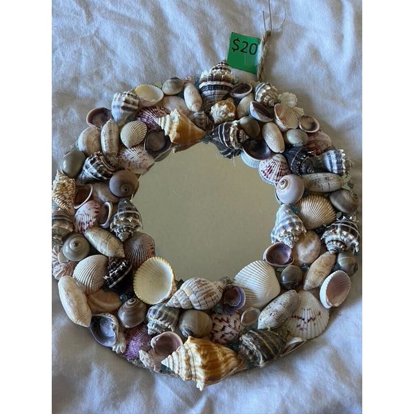 Round Mirror Surrounded By An Assortment Of Shells 11 inches