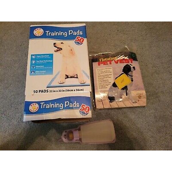 pet training pads 22" X22" Pet Flotation Device And Water Bottle PreOwned