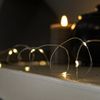Festive Lights Outdoor Micro Lights - Battery Powered - 50 LEDs - Silver Firefly Wire - Warm White