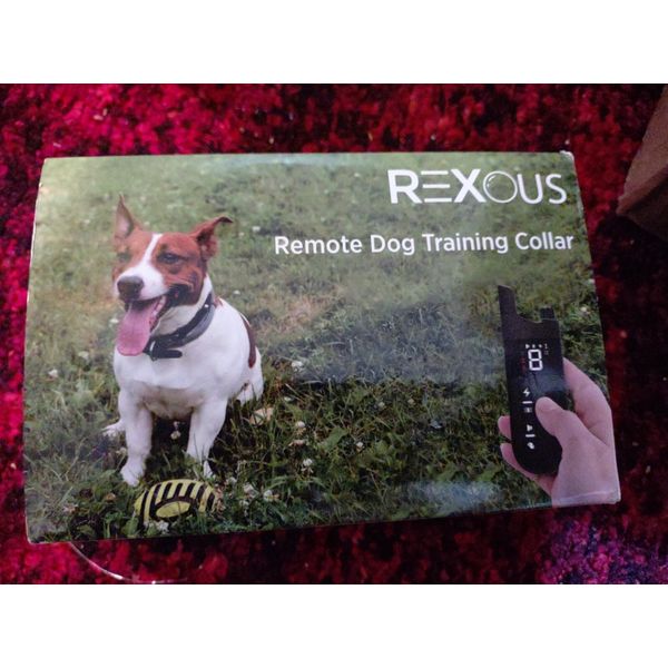 REMOTE DOG TRAINING COLLAR - REXOUS.  NEW IN BOX.