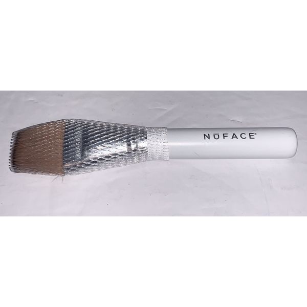 Nuface brush New with protective wrap white