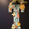 Personalized and customized child initial with name, nursery colors and theme. Under $25. Child gift
