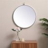Pemberly Row 18" Round Mid-Century Metal Frame Hooked Mirror in Silver