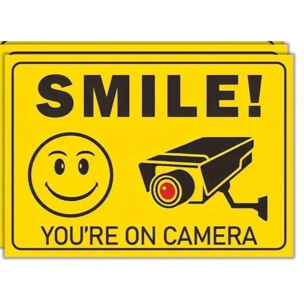 2-Adhesive Vinyl "SMILE YOU'RE ON CAMERA" Bright Yellow Security Signs 10" X 7"