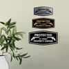 Fancy Protected by Armed Property Owner .45 Sign (Black Gold) - Large 1 Pack