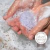 Natural Lavender Solid Shampoo Bar by Tangie. Lasts 50+ washes. Made in Florida, USA. Paper packaging is recyclable and compostable.