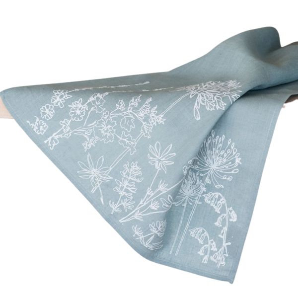 Helen Round Linen Tea Towel, duck egg blue. This beautiful, hand printed towel features garden flowers. Machine Washable at 40 degrees and will compliment your kitchen decor perfectly. Size 70 x 46cm