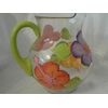 Hand painted Multi hibiscus round style pitcher. Made in the usa.
