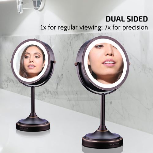 OVENTE 7'' Lighted Tabletop Makeup Mirror, 1X & 7X Magnifier, Spinning Double Sided Round LED, Great for Vanity, Bath, & Bedroom, Battery Powered, Antique Bronze MCT70ABZ1X7X