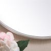Pemberly Row 18" Round Mid-Century Metal Frame Hooked Mirror in Silver