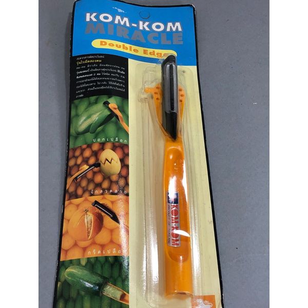 Thailand  KomKom Vegetable Peeler, Stainless steel straight edge. can set angles