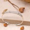 Tuscany Silver Women's Sterling Silver 3 Rows Hearts Torque Bangle