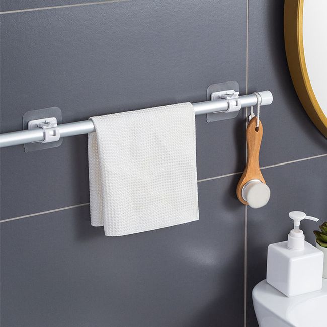 Paper towel holder with adjustable width