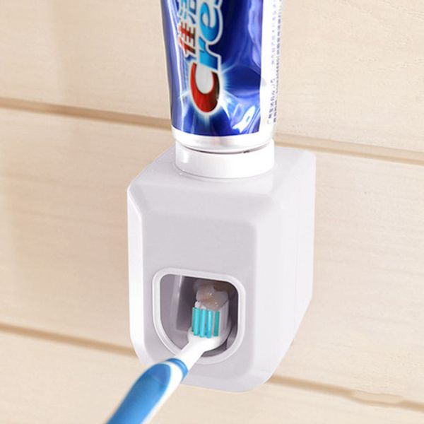 One-touch toothpaste dispenser