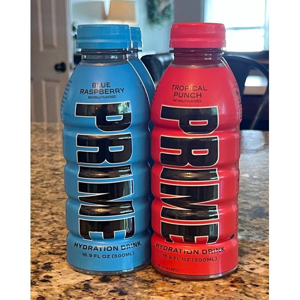 PRIME Hydration Drink 4pk: Fruit Punch/ Blue Raspberry 16.9oz. Logan Paul x KSI