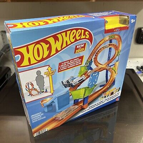 Toy Car Track Set with Figure-8 Jump & 164 Scale Car 2-ft Tall Track Connects