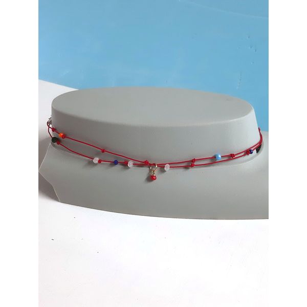 red choker necklace