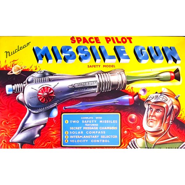 Toy Space Pilot Nuclear Missle Gun on Laminated Metal Based Fridge Magnet