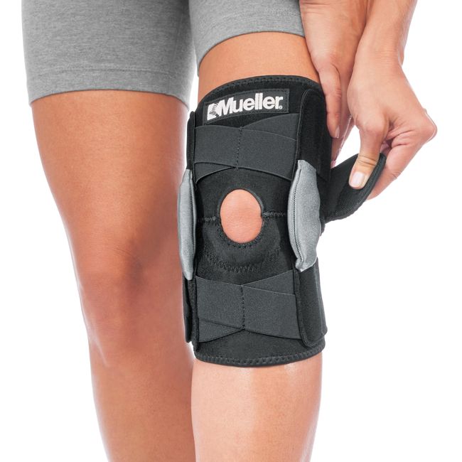 MUELLER Sports Medicine Hinged Wrap Around Knee Brace for Adults, Men and Women Knee Support for Pain, Injury, or Arthritis, Black/Gray,12-21 Inches, One Size Fits Most