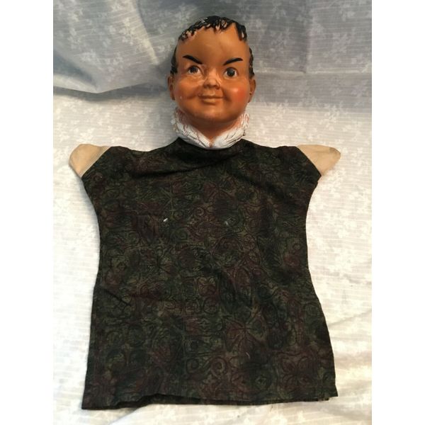 vintage hand puppet. Soft vinyl.  Big collar in back. Painted black hair.  Face