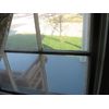 Interior secondary storm windows