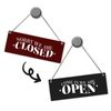 We are open or we are closed reversible sign with cord in black and red