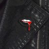 Cafty's Black Glitter Sexy Vampire Bleeding Lips Enamel pin.