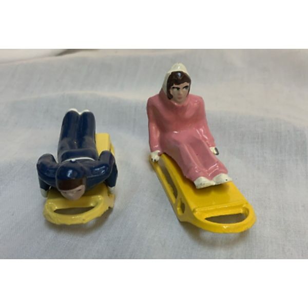 Vintage L&M Painted Metal Cast Figures 2 Sledders on Sleds