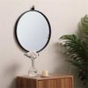 Pemberly Row 18" Round Mid-Century Metal Frame Hooked Mirror in Black