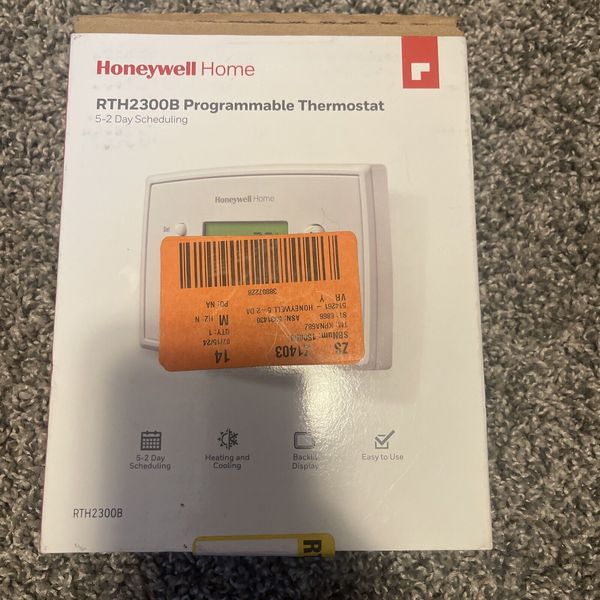 Honeywell 5-2 Day Programmable Thermostat (RTH2300B1038) may be missing screws