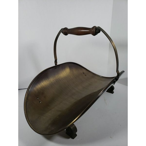 VINTAGE BRASS FIREPLACE WOOD CARRIER, SWIVEL HANDLE FOR STABILITY.