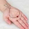 Philip Jones July (Ruby) Birthstone Bracelet Created with Zircondia® Crystals