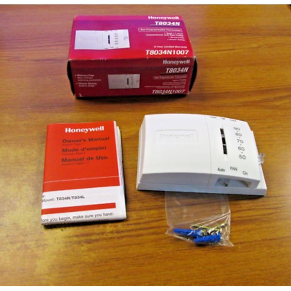 NIB. HONEYWELL NON PROGRAMMABLE THERMOSTAT CAT# T8034N1007 ... VV-120