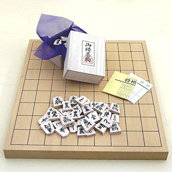 Shogi set, new Kaya 1-inch tabletop jointed shogi board, bamboo and white camellia carved pieces