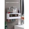automatic toothpaste dispenser toothbrush holder